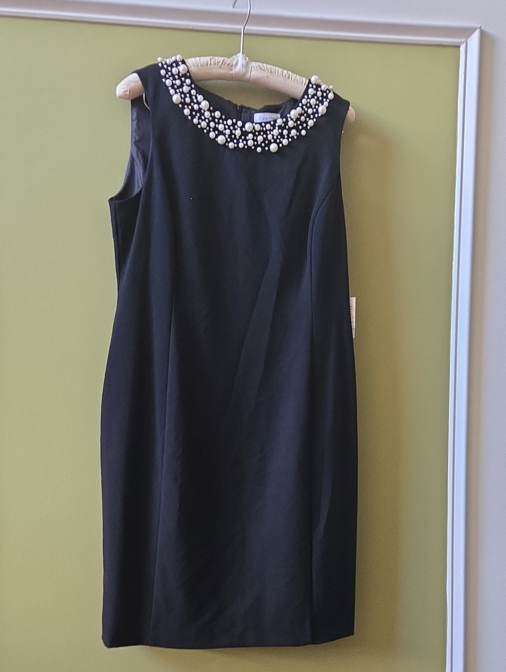 Calvin Klein black dress featuring a  Beaded Pearl Collar